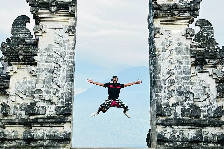 Travellers framed by Lempuyang Gates of Heaven viewpoint