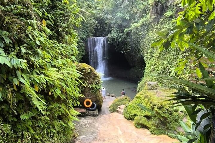Hidden waterfall accessible through Ubud jungle trail